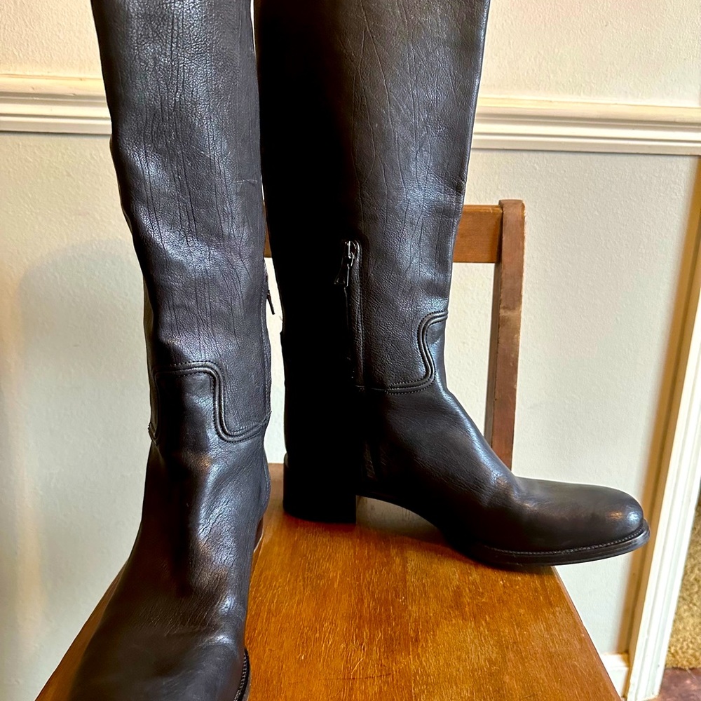 PRADA Leather Riding Boots (Black) with a Partial side
Zipper closure.